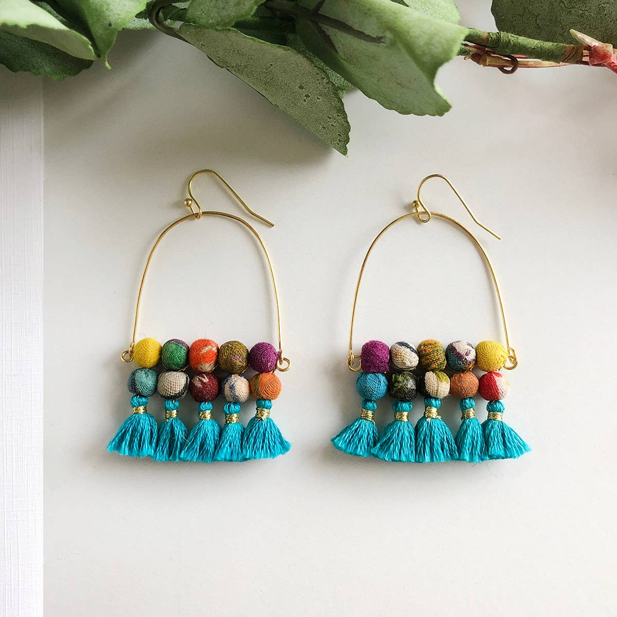 WorldFinds - Arched Turquoise Tassel Earrings